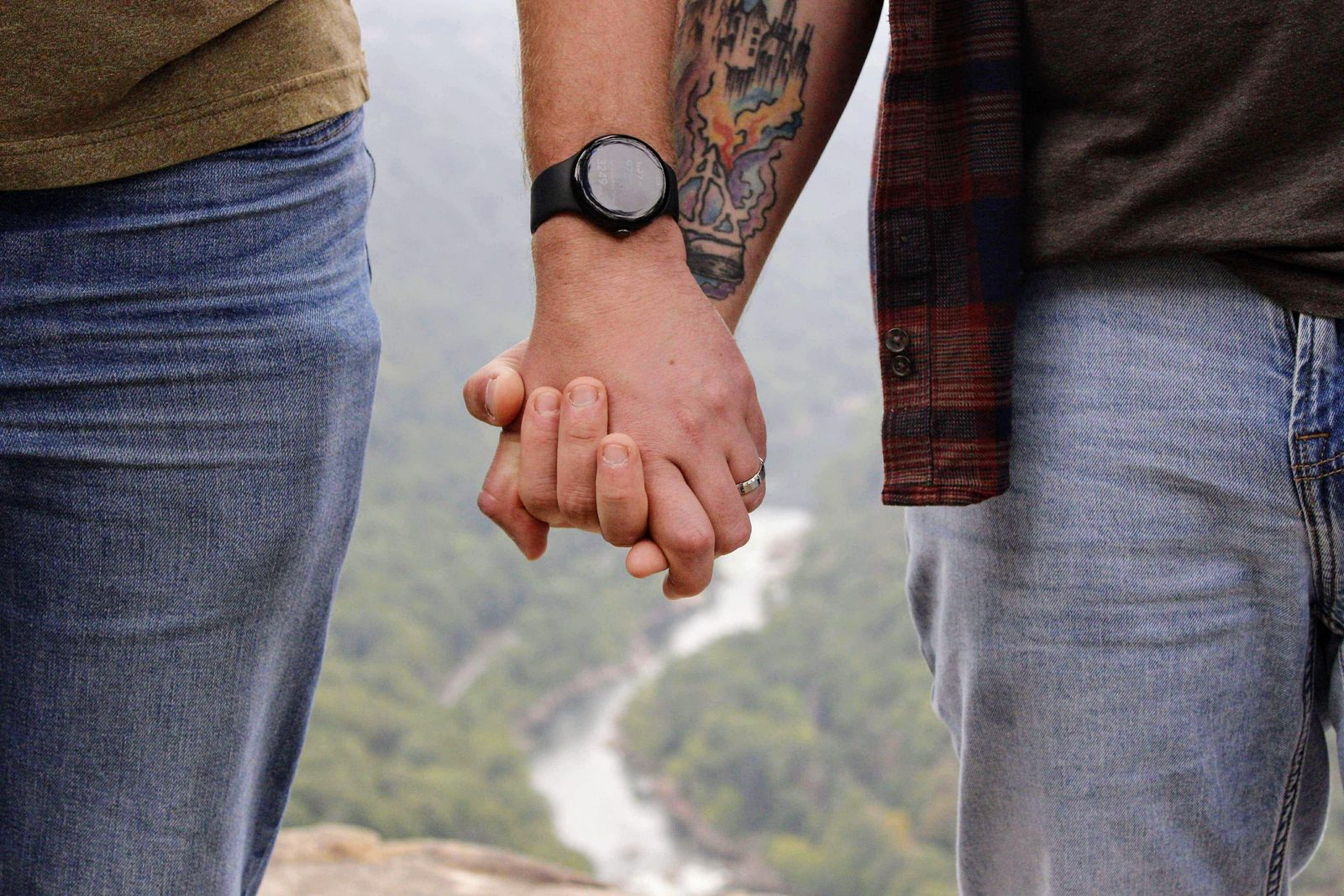 Holding hands above the gorge